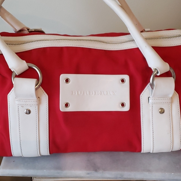 Burberry Handbags - Burberry small duffle/weekender bag